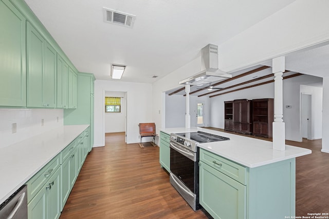 1312 Acorn, Hondo, TX 78861 - kitchen featuring stainless steel appliances, green cabinetry, island range hood, dark wood-type flooring, and decorative columns