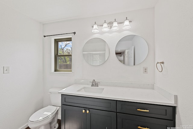 1312 Acorn, Hondo, TX 78861 - bathroom featuring vanity and toilet