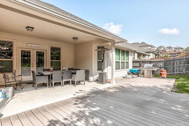 25514 Vista Bella, San Antonio, TX 78260 - wooden terrace with area for grilling, french doors, and outdoor dining space
