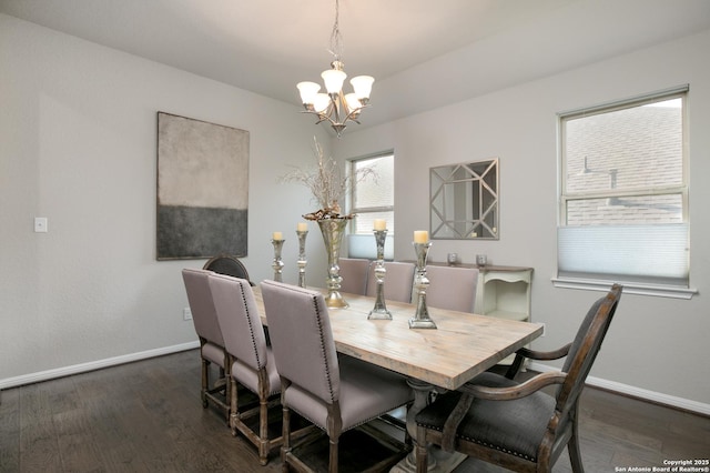 25514 Vista Bella, San Antonio, TX 78260 - dining space with a chandelier, baseboards, and dark wood-type flooring