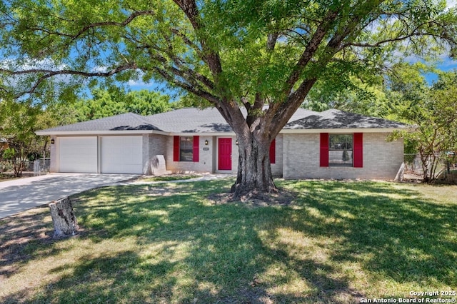 4203 Quail, San Antonio, TX 78217 - single story home with a garage, concrete driveway, and brick siding