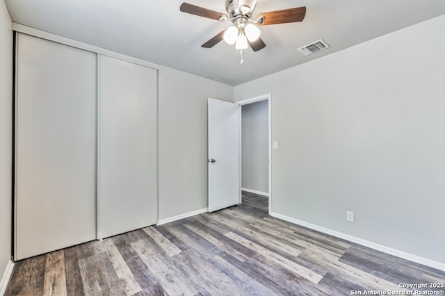 4203 Quail, San Antonio, TX 78217 - unfurnished bedroom with a closet, wood finished floors, baseboards, and a ceiling fan