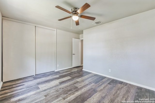 4203 Quail, San Antonio, TX 78217 - unfurnished bedroom with wood finished floors, a closet, baseboards, and a ceiling fan