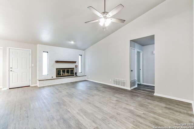 4203 Quail, San Antonio, TX 78217 - unfurnished living room featuring lofted ceiling, ceiling fan, wood finished floors, and baseboards