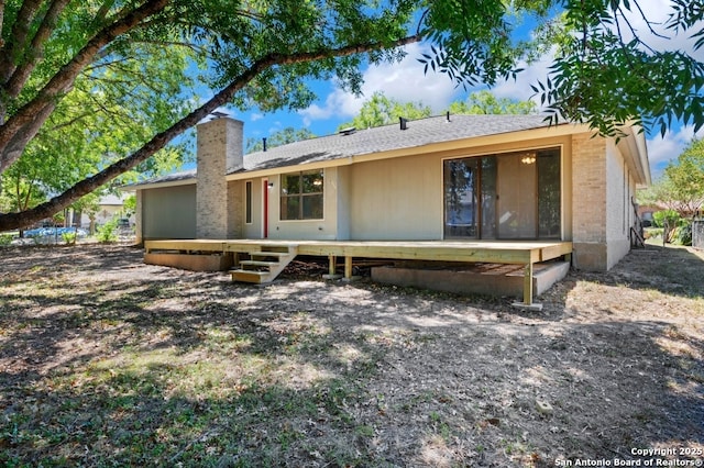 4203 Quail, San Antonio, TX 78217 - rear view of house with a chimney and brick siding