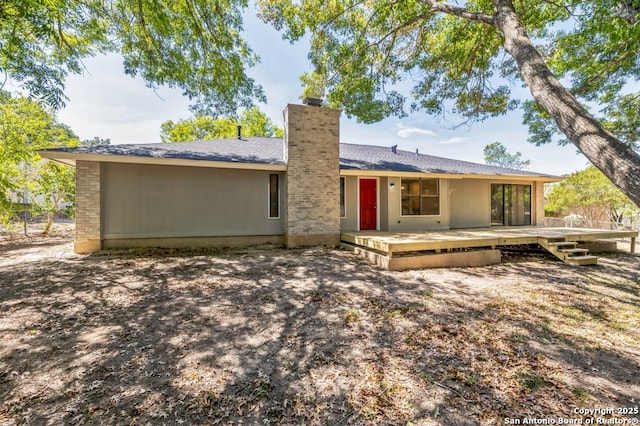 4203 Quail, San Antonio, TX 78217 - rear view of property featuring a chimney and a wooden deck