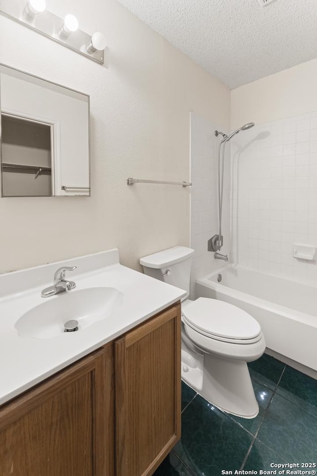 8134 Cheryl Mdw, Converse, TX 78109 - bathroom with vanity, toilet, a textured ceiling, tile patterned flooring, and washtub / shower combination