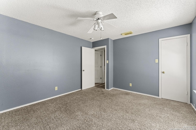 8134 Cheryl Mdw, Converse, TX 78109 - unfurnished bedroom featuring carpet flooring, a textured ceiling, baseboards, and a ceiling fan