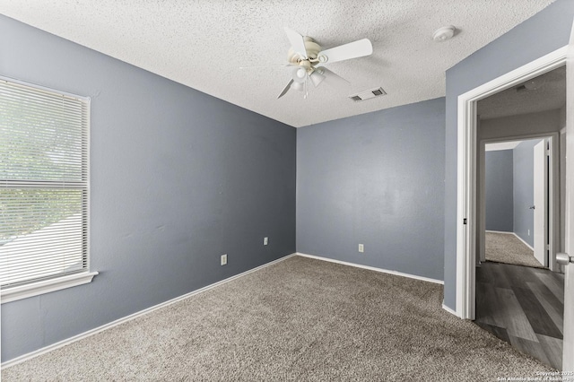 8134 Cheryl Mdw, Converse, TX 78109 - unfurnished room featuring carpet floors, ceiling fan, a smoke detector, a textured ceiling, and baseboards