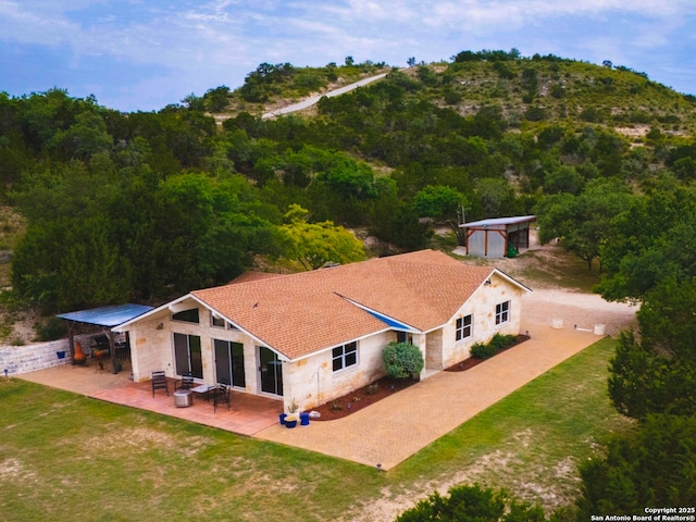 1231 Montell, Wimberley, TX 78676 - view from above of property with a heavily wooded area