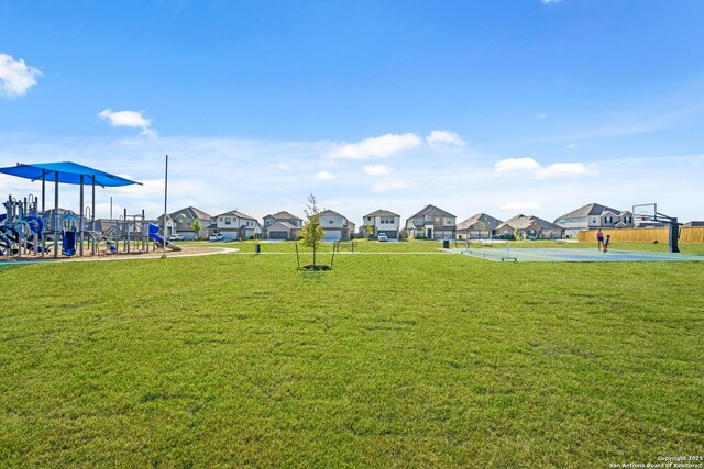2638 Downsbury Dr, New Braunfels, TX 78130 - view of property's community featuring a lawn, a residential view, and community basketball court