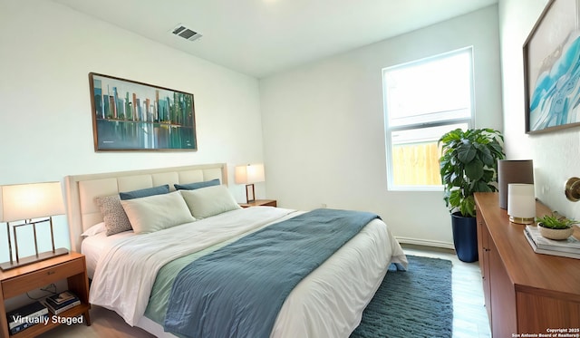 4211 Cove, San Antonio, TX 78223 - bedroom featuring wood finished floors and baseboards