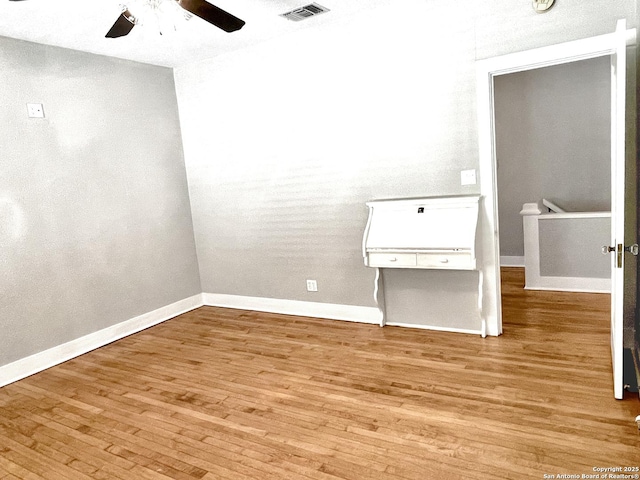 436 W Gramercy Pl, San Antonio, TX 78212 - spare room with ceiling fan, light wood-type flooring, and baseboards