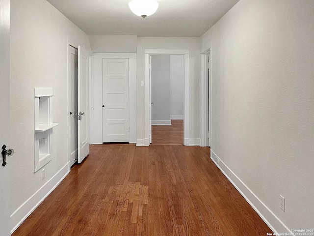 436 W Gramercy Pl, San Antonio, TX 78212 - corridor featuring baseboards and dark wood finished floors