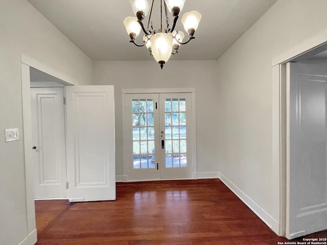 436 W Gramercy Pl, San Antonio, TX 78212 - unfurnished dining area featuring wood finished floors, a chandelier, baseboards, and french doors