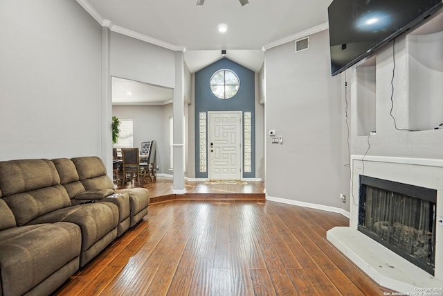 6806 Arrow, San Antonio, TX 78256 - living room with crown molding, hardwood / wood-style floors, vaulted ceiling, ceiling fan, and baseboards