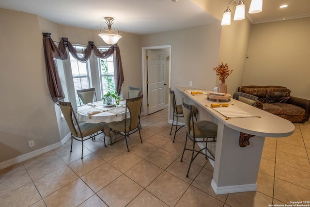 633 Sunrise Ave, Uvalde, TX 78801 - dining room featuring baseboards and light tile patterned floors