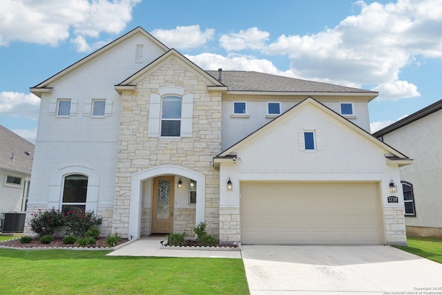 27118 Dana Creek Dr, Boerne, TX 78015 - french country inspired facade featuring stone siding, central AC, driveway, and a front yard