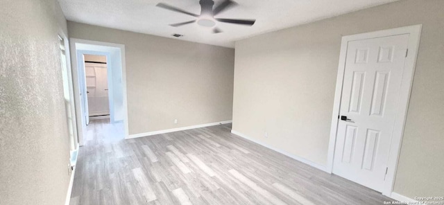 6115 Calderwood St, San Antonio, TX 78249 - spare room with ceiling fan, wood finished floors, and baseboards