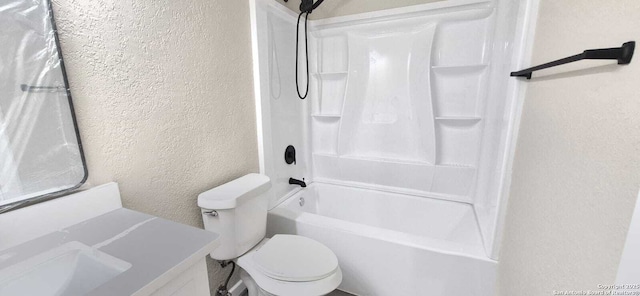 6115 Calderwood St, San Antonio, TX 78249 - full bathroom with a textured wall, toilet, tub / shower combination, and vanity
