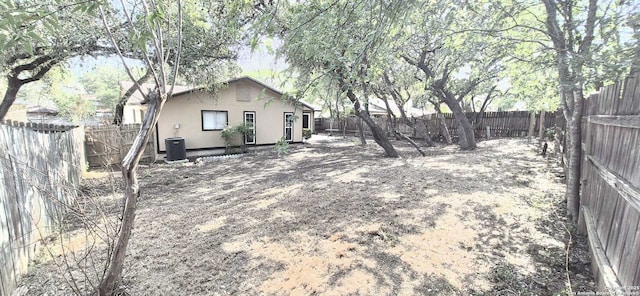 6115 Calderwood St, San Antonio, TX 78249 - fenced backyard featuring central air condition unit