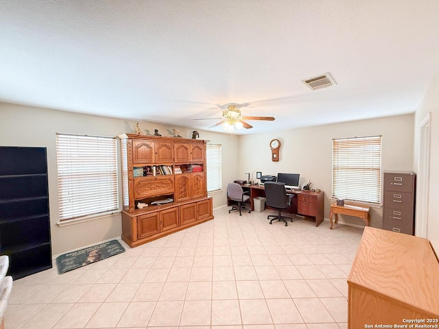 1185 County Road 7718, Devine, TX 78016 - home office with ceiling fan and baseboards