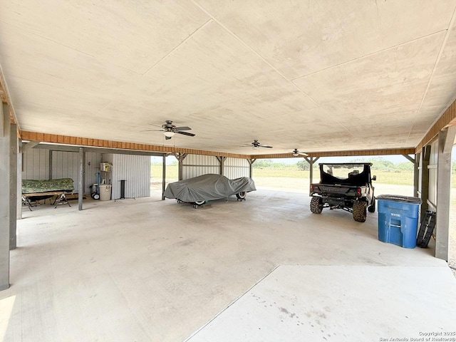 1185 County Road 7718, Devine, TX 78016 - garage with ceiling fan