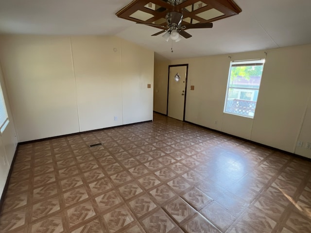 2230 Bear Springs Dr, San Antonio, TX 78245 - spare room featuring lofted ceiling, a ceiling fan, and light flooring