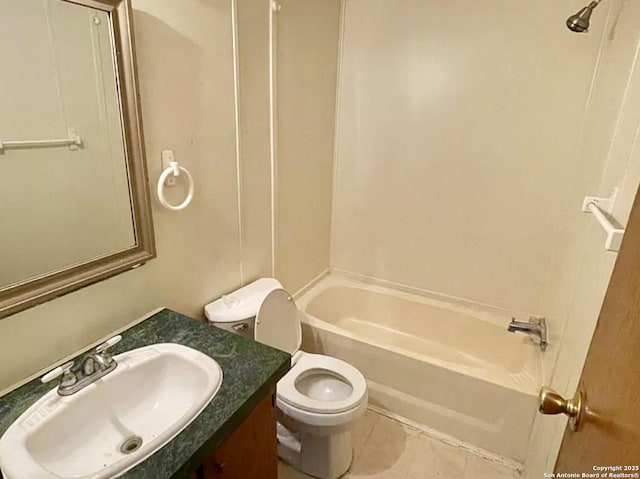 2230 Bear Springs Dr, San Antonio, TX 78245 - bathroom with toilet, washtub / shower combination, tile patterned flooring, and vanity