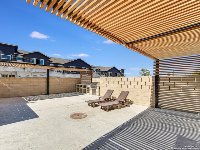 2050 Lohmans Spur Unit, Lakeway, TX 78734 - fenced backyard with a patio area