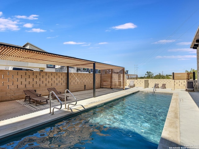2050 Lohmans Spur Unit, Lakeway, TX 78734 - view of swimming pool featuring a fenced backyard and a patio area