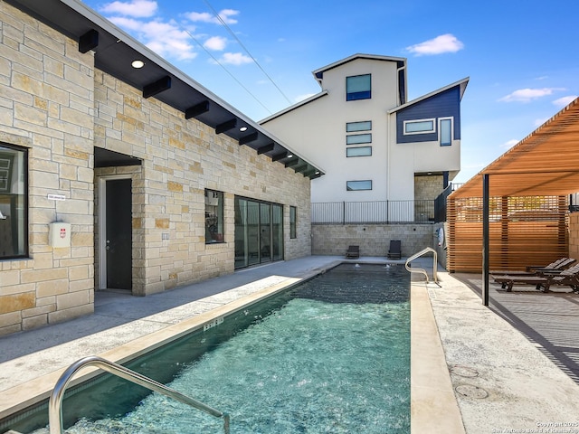 2050 Lohmans Spur Unit, Lakeway, TX 78734 - view of pool featuring a patio