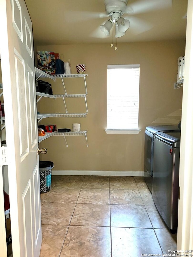 26106 Indian Clf, San Antonio, TX 78260 - laundry area featuring separate washer and dryer, ceiling fan, and baseboards