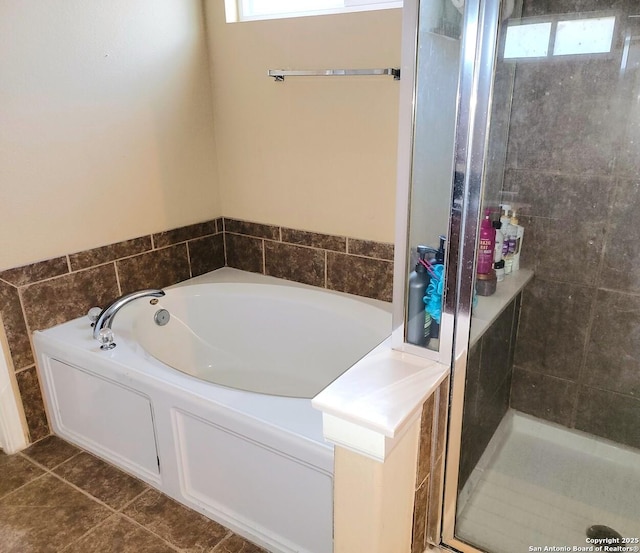 26106 Indian Clf, San Antonio, TX 78260 - full bath featuring healthy amount of natural light, a bath, a stall shower, and tile patterned floors