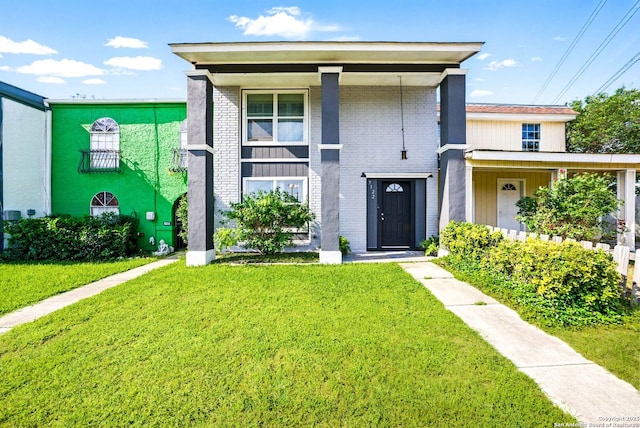 7122 Brecon, San Antonio, TX 78239 - view of front of property with a front yard and brick siding