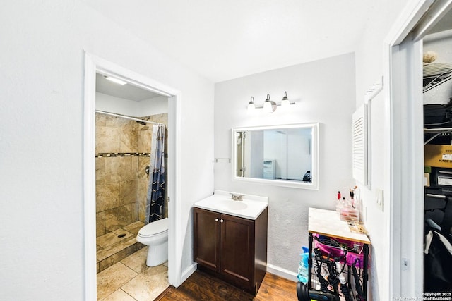 7122 Brecon, San Antonio, TX 78239 - full bath with vanity, a tile shower, toilet, and a closet
