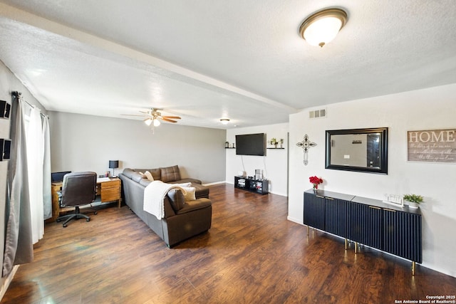 7122 Brecon, San Antonio, TX 78239 - living area with wood finished floors, a ceiling fan, a textured ceiling, a desk, and baseboards