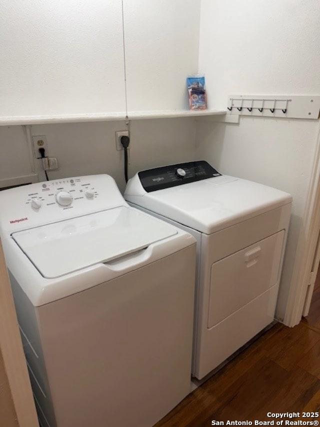 6210 Valley Clf, San Antonio, TX 78250 - laundry room featuring washing machine and dryer and dark wood-style flooring