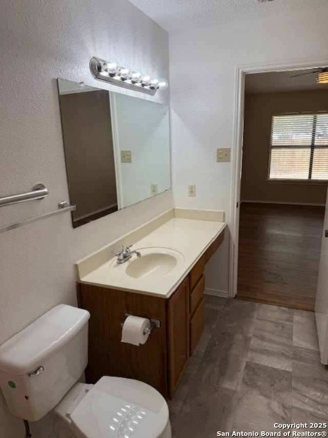 6210 Valley Clf, San Antonio, TX 78250 - bathroom with toilet and vanity