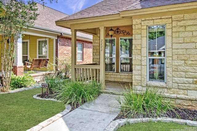 2222 Gruene Lk, New Braunfels, TX 78130 - view of exterior entry featuring a porch and stone siding