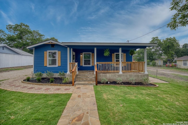 1437 Avant, San Antonio, TX 78210 - bungalow with covered porch and a front yard