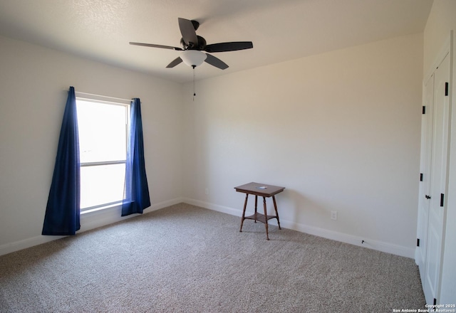 2516 County Road 357, La Vernia, TX 78121 - carpeted empty room featuring ceiling fan and baseboards