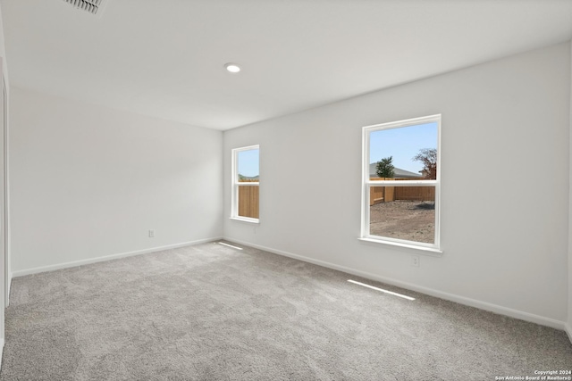 14923 Telfaire Mdw, Von Ormy, TX 78073 - empty room featuring baseboards and carpet