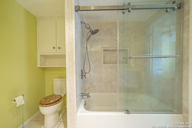 3922 Barrington Unit 0, San Antonio, TX 78217 - bathroom featuring toilet, enclosed tub / shower combo, a textured ceiling, and tile patterned floors