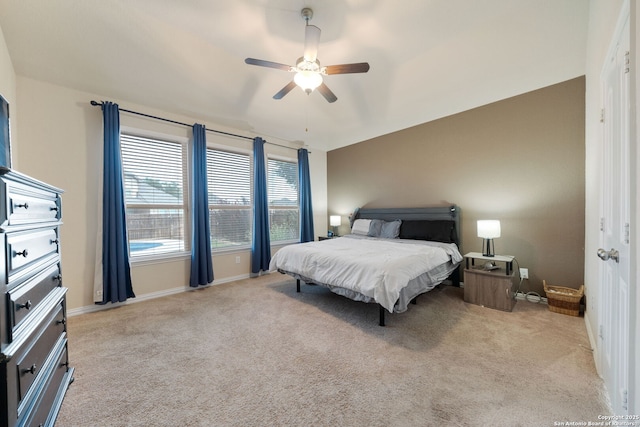 8726 Hideout, San Antonio, TX 78254 - bedroom featuring light colored carpet, baseboards, and ceiling fan