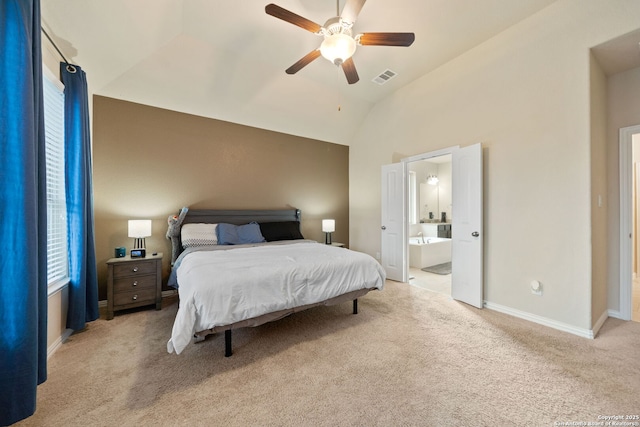 8726 Hideout, San Antonio, TX 78254 - bedroom with vaulted ceiling, carpet flooring, baseboards, ensuite bath, and a ceiling fan