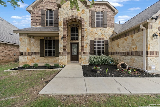 8726 Hideout, San Antonio, TX 78254 - view of front of property with stone siding and roof with shingles