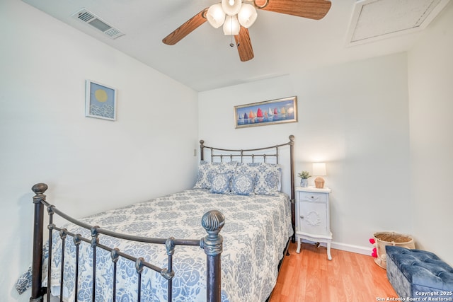 806 Highcrest # 19, Granite Shoals, TX 78654 - bedroom with wood finished floors, baseboards, and a ceiling fan