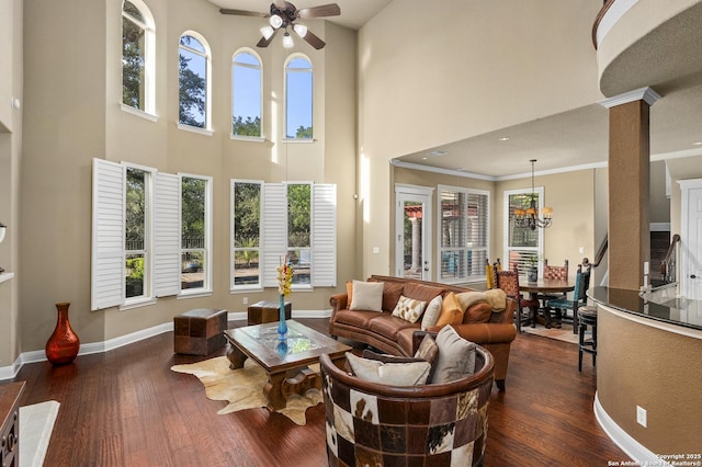 7414 Hovingham, San Antonio, TX 78257 - living room with a high ceiling, plenty of natural light, a ceiling fan, dark wood-style floors, and ornamental molding