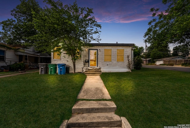 1019 Chicago Blvd, San Antonio, TX 78210 - view of front of property with a lawn and stone siding
